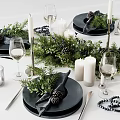 Elegant Tableware Set With Black Plates Napkins Greenery Pine Cones Candles And Wine Glasses