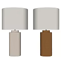 Light And Brown Table Lamps With Textured Cylindrical Base And Fabric Shade