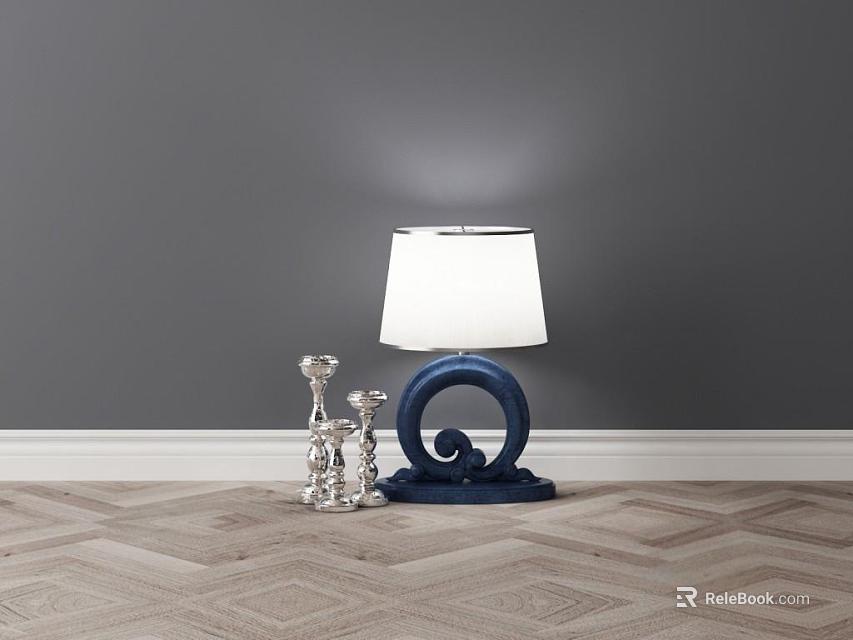 Blue Ring Table Lamp With White Shade And Silver Figurines On Gray Wall Herringbone Floor 3d model 