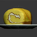 Delicious Yellow Cake Roll With Orange Stripes And White Cream Filling On White Plate