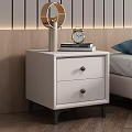 Modern Light Colored Bedside Table With Two Drawers Black Knobs Lamp Clock And Books 3d model