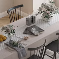Dining Table Set With Tablecloth Black Chairs Wooden Legs And Flower Centerpiece