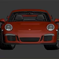 Red High Performance Sports Car With Large Rear Spoiler And Black Wheels