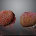 Fresh Ripe Red And Yellow Apples On Black Surface With Reflections