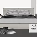 Double Bed with Light Gray Headboard White Pillows Checkered Blanket and Linen Closet Bag