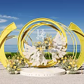 Beach Wedding Ceremony Setup With Yellow Circular Arches And Floral Decorations