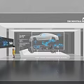 Industrial Development Exhibition Featuring Displayed Car Digital Screens And Visitors