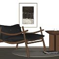 Black Leather Armchair With Wooden Frame And Side Table On Round Rug With Wall Art