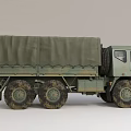 Military Off Road Cargo Truck With Green Canvas Covered Bed And Multiple Wheels