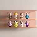 Colorful Small Dolls Displayed On Two Tier Orange Shelf With Various Styles