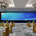 Spacious Conference Room With Large Main Screen Side Displays And Neatly Arranged Gray Seats