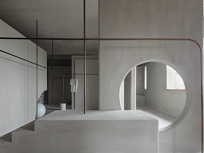 Modern Clothing Store With Minimalist Design Gray Tones Open Space Round Archway And Display Cabinets 3d model