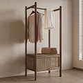 Minimalist Wooden Coat Rack With Hanging Clothes And Rattan Cabinet In Indoor Space