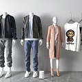 Mannequins Displaying Stylish Outfits With Black Gray Jackets Blue Jeans Pink Coat And White Tshirts