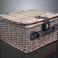 Playful Kitten Exploring Handwoven Rattan Box With Black Metal Fastener