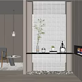 Modern Entryway Design With Glass Block Wall Black Countertop Green Plant and Pebble Floor