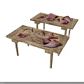 Two Rustic Wooden Coffee Tables With Red And Pink Petal Decorations