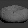 White Soft Bean Bag Chair with Round Wrinkled Fabric on Dark Reflective Surface