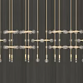 Illuminated Golden Chandeliers with Round Bulbs and Metal Bars Hanging on Dark Vertical Striped Background