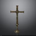 Intricate Golden Cross Sculpture with Red and Green Inlaid Decorations on Ornate Base