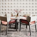 Modern Round Dining Table With Pink Padded Chairs And Vase On Circular Patterned Wall 3d model