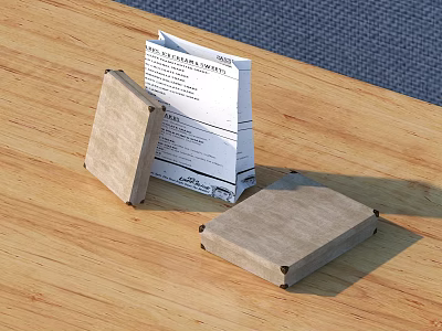 Light Brown Square Decorative Ornament Set With White Paper Label On Wooden Tabletop 3d model