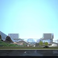 Modern Architectural Complex With Curved Roof Glass Structure And Water Reflection Evening Scene