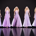 Five Blonde Women Standing in Purple Long Dresses Against Dark Background With Reflection