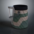 Computer Desk Cup With Green Beige Zigzag Pattern Black Rim Silver Handle And Rope Grip 3d model