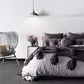 Double Bed with Purple Bedding Pom Pom Details Wicker Chair and Pendant Light