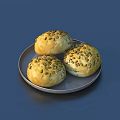 Three Seeded Bread Rolls on Silver Plate Against Dark Blue Background