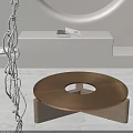Minimalist Golden Round Coffee Table With Circular Cutout And Wooden Base In Modern Space
