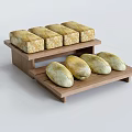 Fresh Bread Loaves Arranged On Multi Tiered Wooden Display Stand