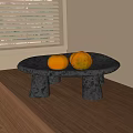 Three Orange Oranges on Black Stone Table Placed on Wooden Countertop by Window with Blinds