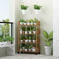 Indoor Garden Decor Featuring Wooden Multi Tiered Shelf With Potted Plants And Hanging White Planters