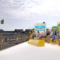 Group Sitting on Yellow Bench with Green Trees Blue Display Boards at New City University