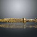 Golden Ancient Dagger with Intricate Carved Patterns on Blade and Decorated Hilt