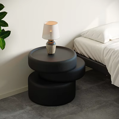 Black Round Stacked Bedside Table with Lamp White Shade Near White Bed and Green Plant 3d model