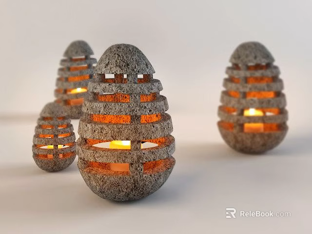 Multiple Egg Shaped Hollowed Out Stone Candle Lanterns with Glowing Light 3d model