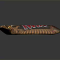 Twix Chocolate Bar With Golden Wrapper And Red Brand Logo