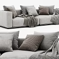Cozy Gray Two-Seater Sofa with Plush Pillows and Knit Throws Modern Design