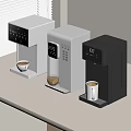 Modern Kitchen Coffee Makers In Three Colors With Coffee Cups On Countertop
