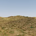 Natural Garden Landscape With Rolling Hills Sparse Grass And Small Stones Under Blue Sky