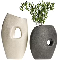 Light And Dark Textured Hollow Vases With Green Foliage For Home Decor