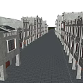 Historic Commercial Street With Rows Of Old Style Buildings And Stone Paved Road
