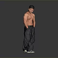 A Shirtless Muscular Man In Dark Cargo Pants And Black White Sneakers Against Grey Background