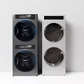 Two Modern Washing Machines With Sleek Design And Round Door For Home Laundry Use