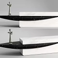 Modern Reception Desk Featuring Black Countertop And White Base With Metal Decorative Design