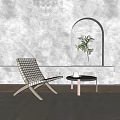 Modern Leisure Chair With Wooden Frame And Woven Seat By Small Table And Potted Plant