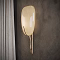 Wall Sconce With Ivory Translucent Lampshade Soft Lighting And Metal Base On Dark Wall